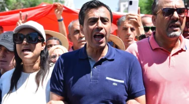 Tunisia hands prison terms to dozens of opposition figures