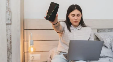 The FTSE 100 has hit a record high. Is now the time to start investing?